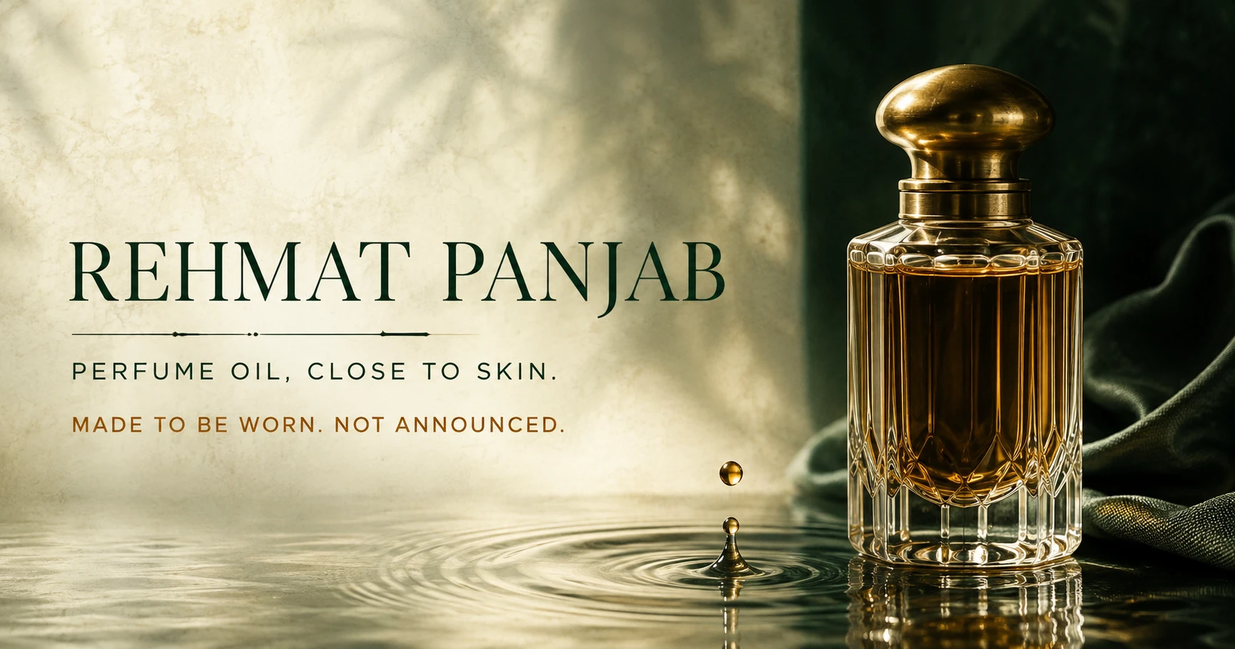 Rehmat Panjab amber perfume oil bottle beside a water ripple